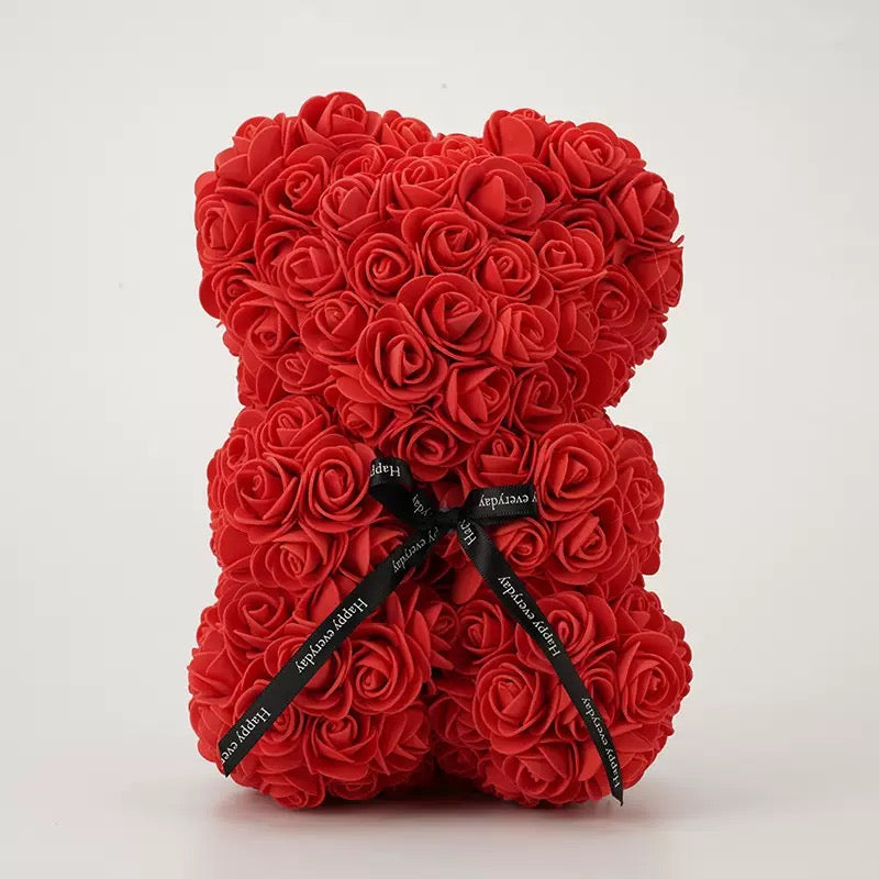 Rosebjørn i kunstige blomster
