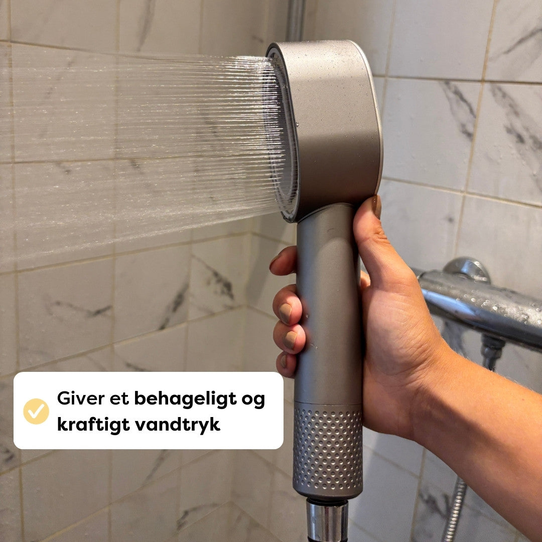 PureNordic brusehoved med udskifteligt filter vist med tilbehør eller pakkeindhold