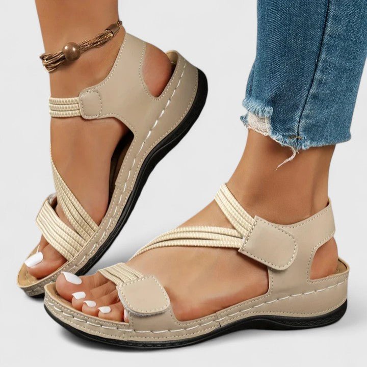Mille komfortsandal med justerbare remme vist med tilbehør eller pakkeindhold
